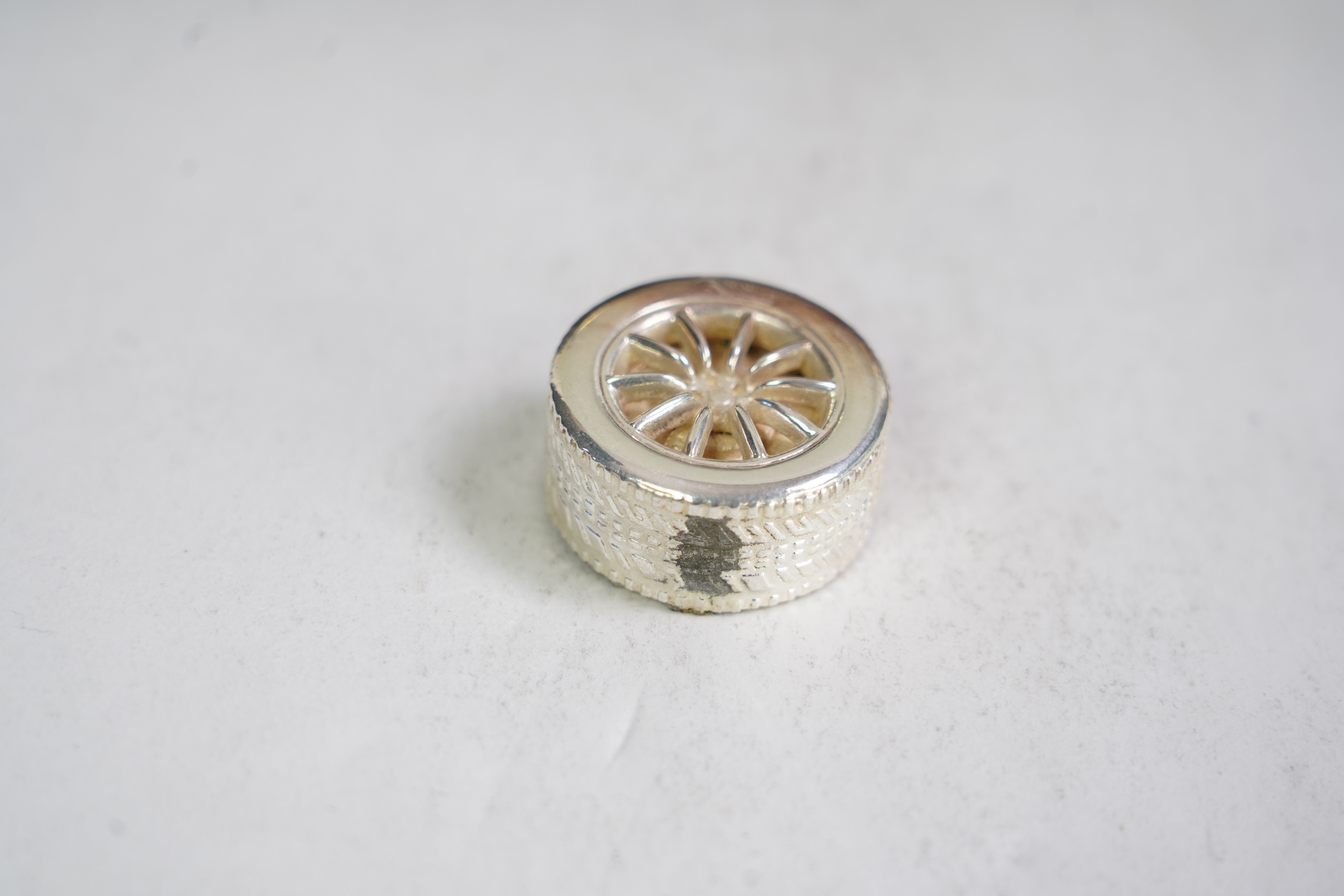 An Elizabeth II miniature silver model of an Aston Martin DB7 Vantage, by Aston Martin Lagonda Design Ltd